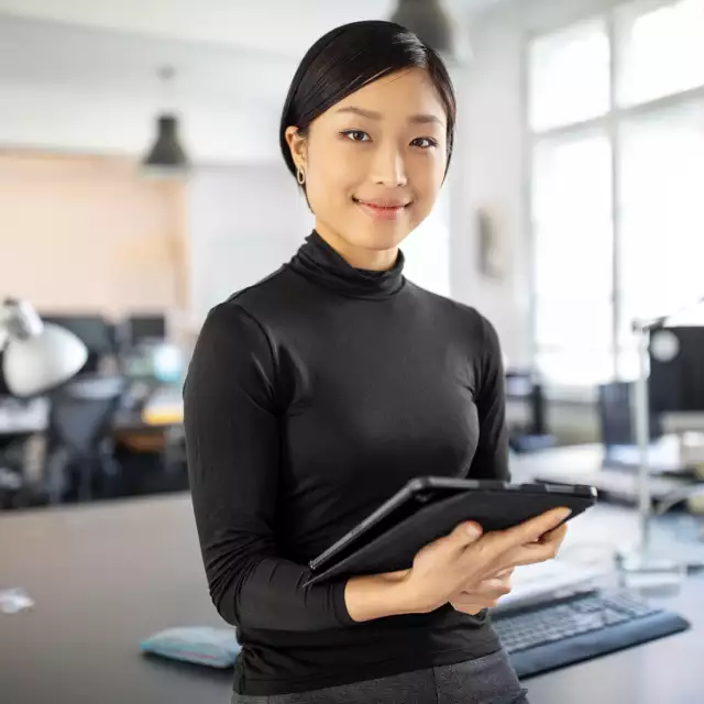 Woman holding a tablet