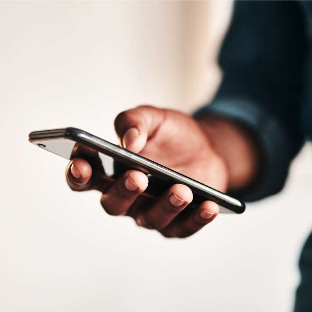 Man holding cell phone