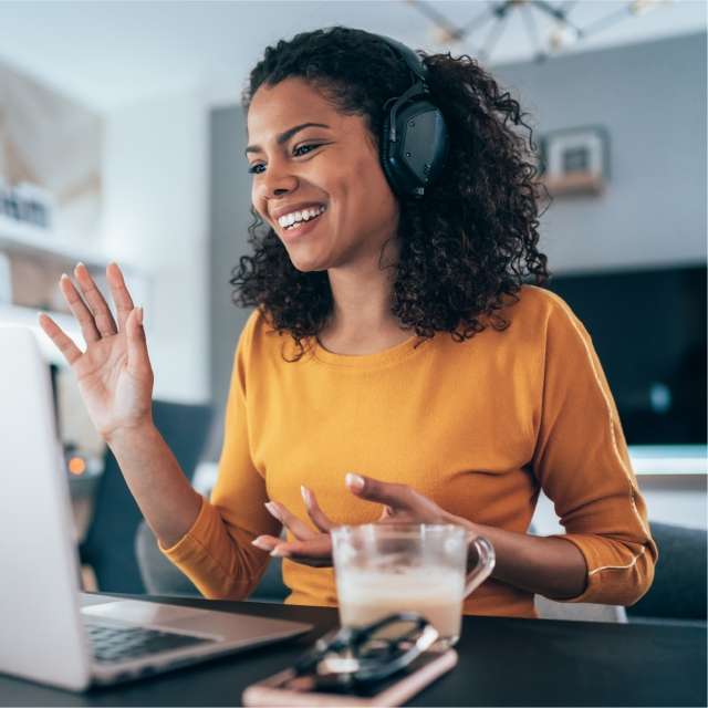 Woman talking on headset and smiling