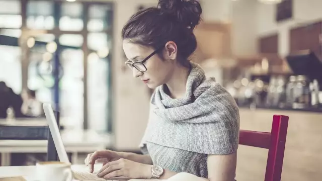 Woman working in coffee shop