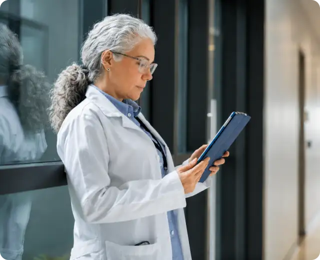 Doctor looking at tablet