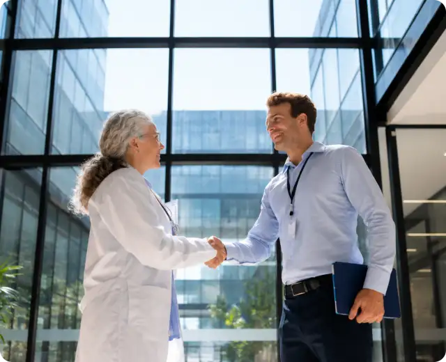 Doctor shaking a man's hand