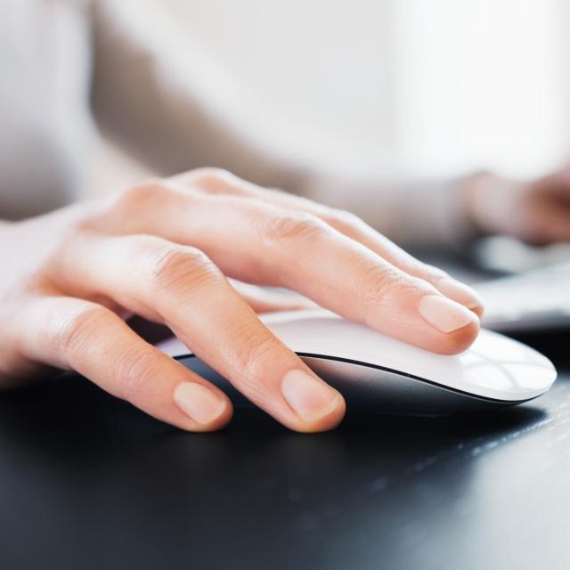 Woman using Conga Sign on laptop