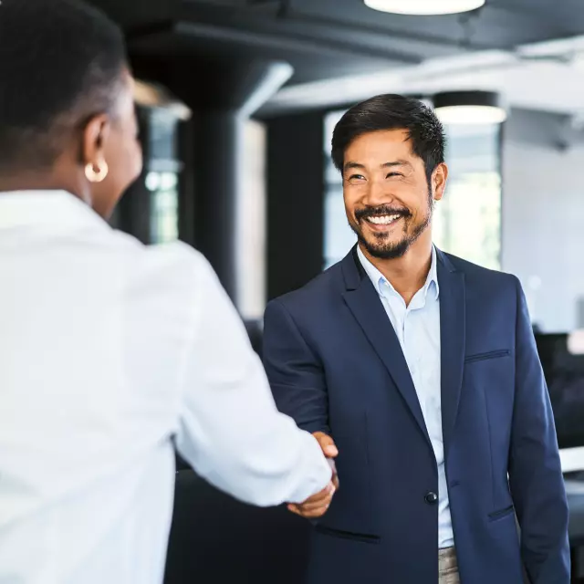 Coworkers shaking hands