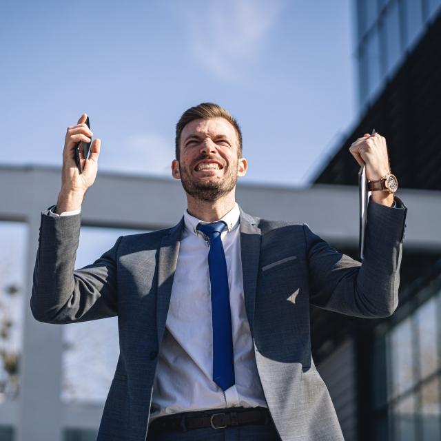 Businessman celebrating