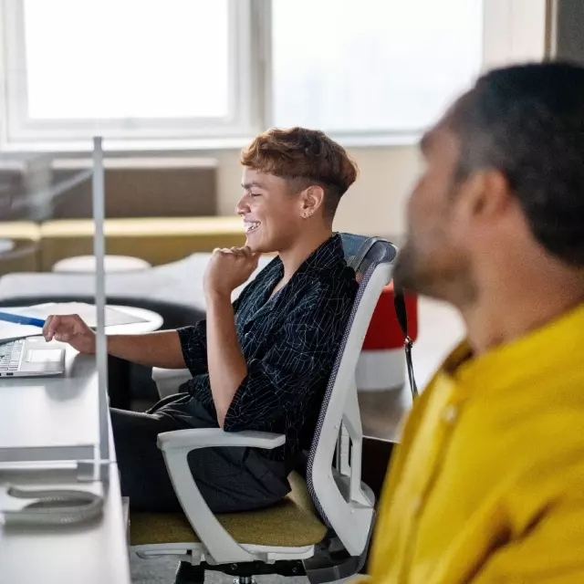 Two men working in office