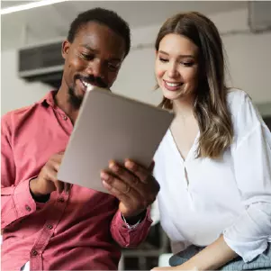 Coworkers reading report