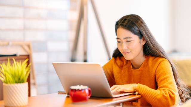 Woman using laptop