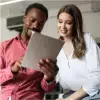 Coworkers reading report